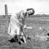 Glenice Smith Anderson Feeding Bum Lamb in Thorton, ID